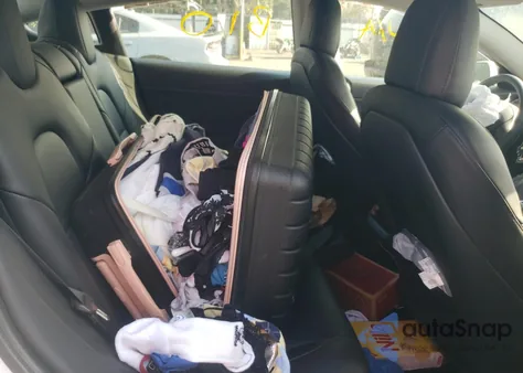 2021 Tesla Model 3 z USA, uszkodzony, nr VIN 5YJ3E1EA1MF940403